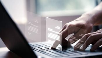 hand-using-laptop-computer-with-virtual-screen-document-online-approve-paperless-quality-assurance-erp-management-concept-848x477-1