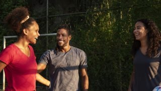 medium_shot_friends_soccer_field-36889881